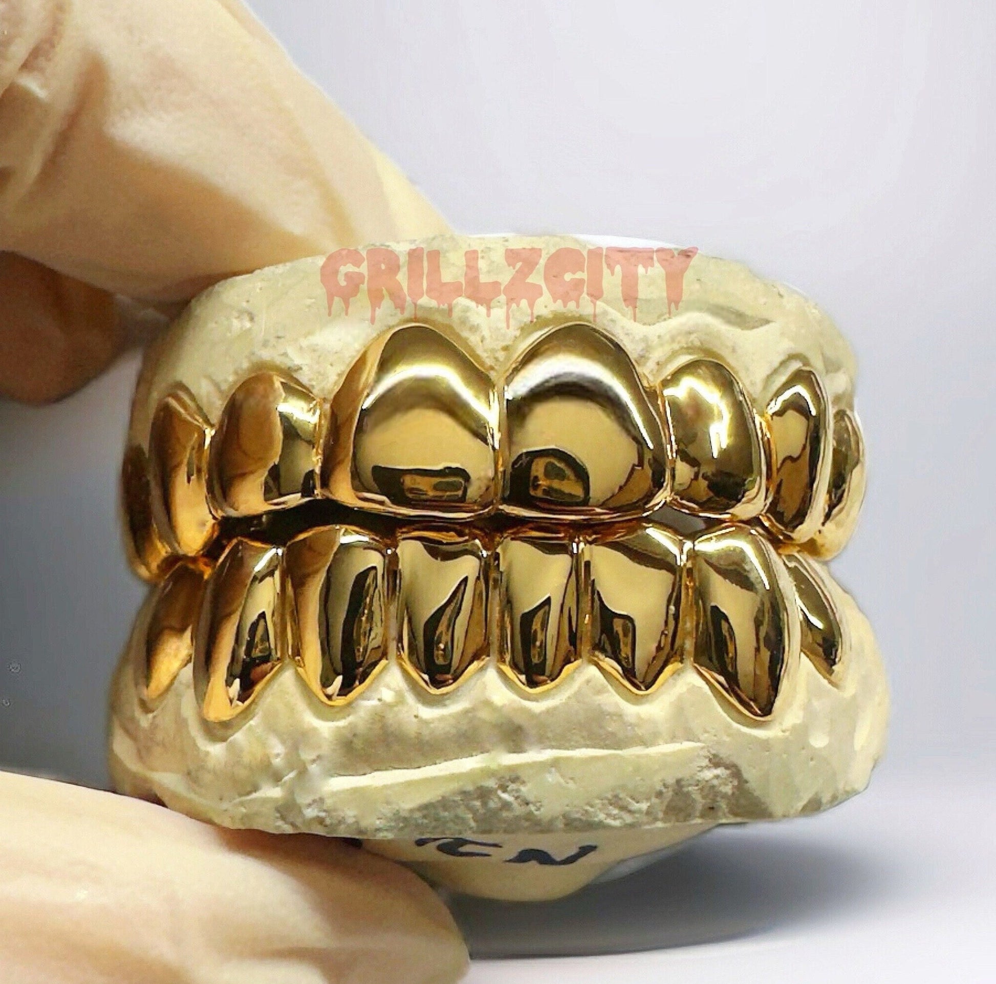 Custom Gold & Silver Grillz - Permanent & Deep Cut Designs - GrillzCity